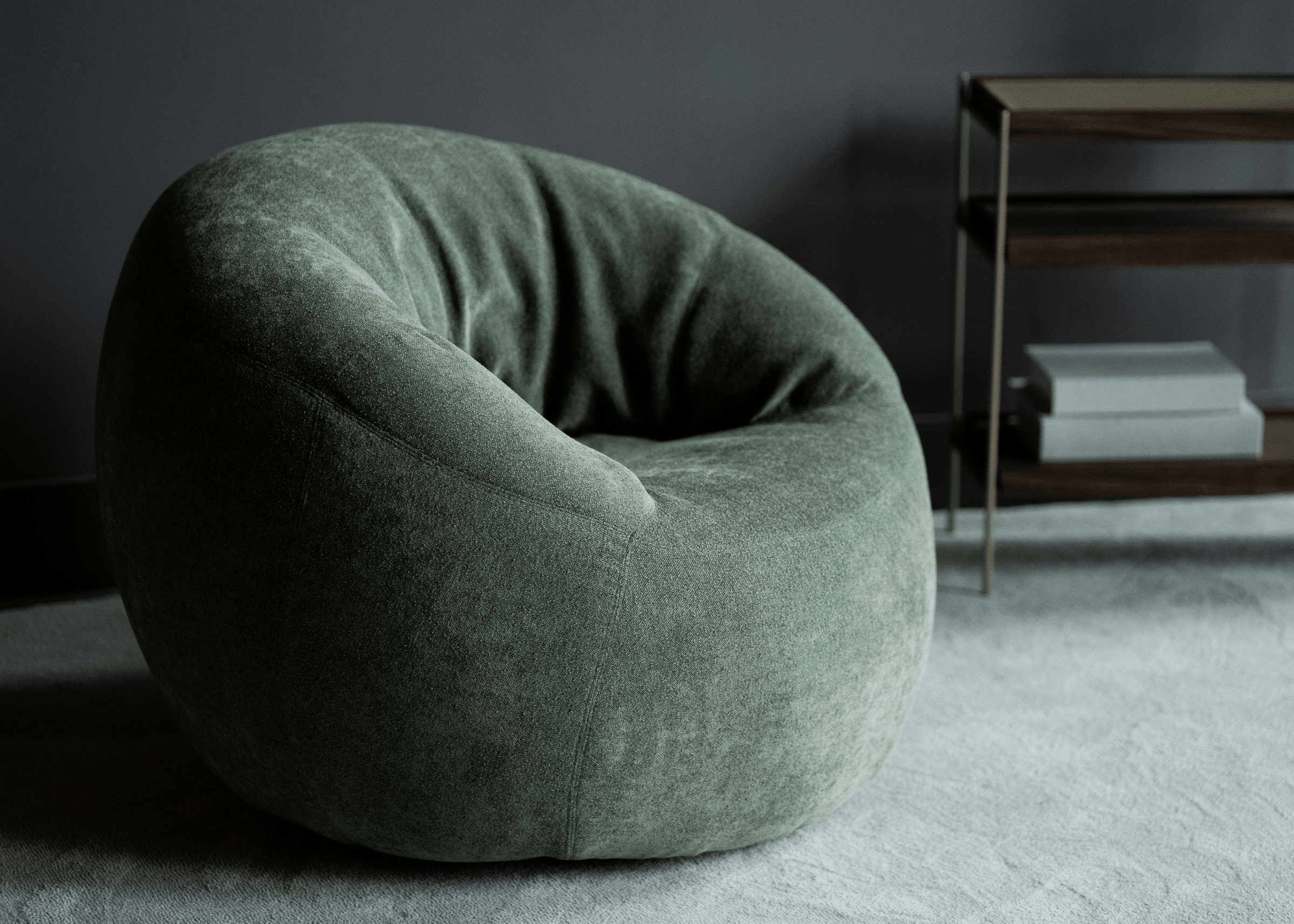 Poltrona Giratória Ravi em sala moderna, com design arredondado e tecido verde sofisticado compondo ambiente aconchegante.