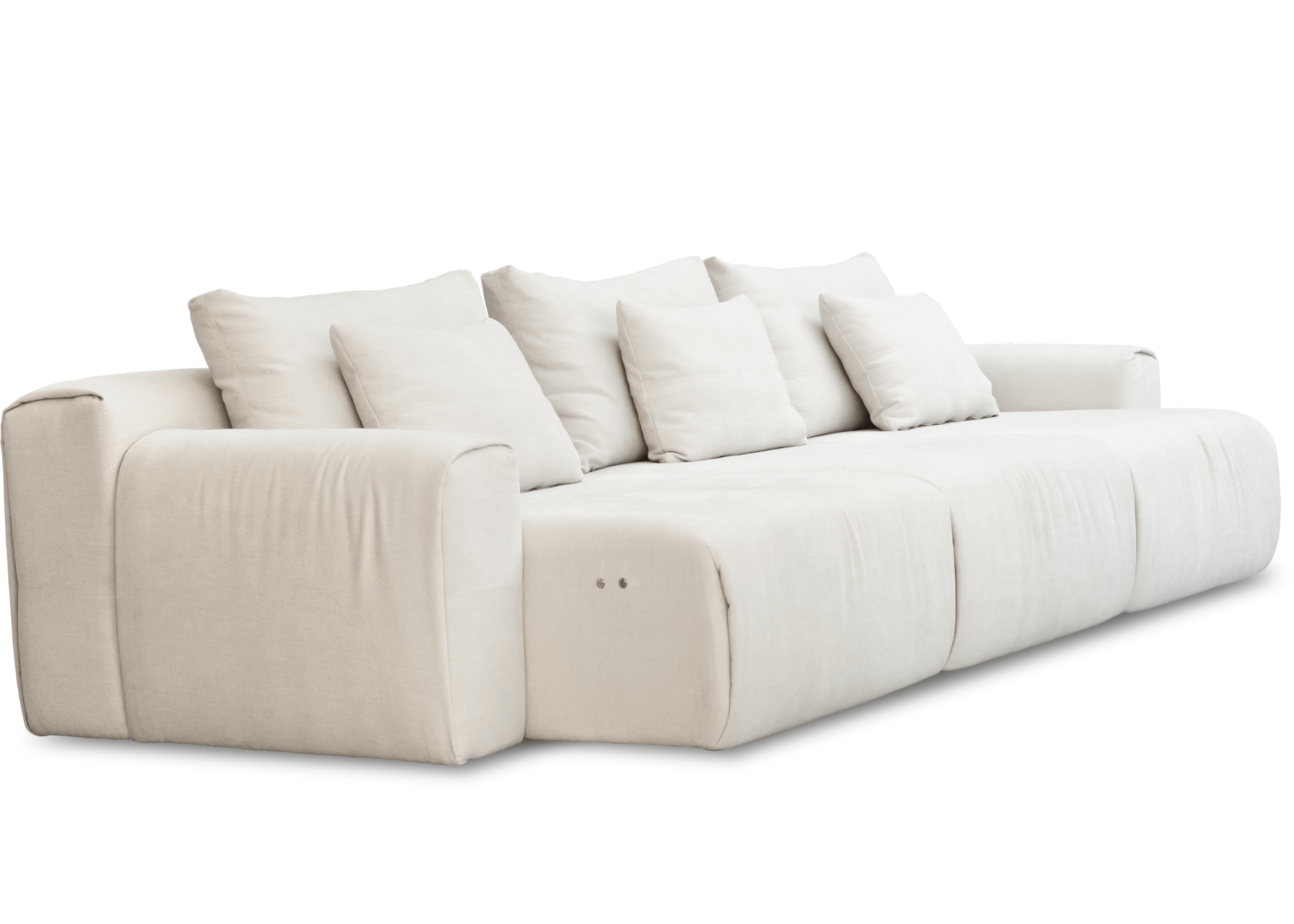 Sofá Dante em perspectiva, módulos generosos e encostos soltos que destacam conforto, modernidade e versatilidade.