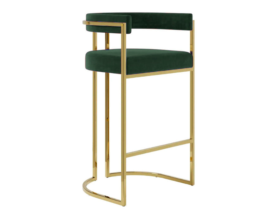 Banqueta alta Eldorado no veludo verde com estrutura em aço inox dourado para áreas de bar sofisticadas.