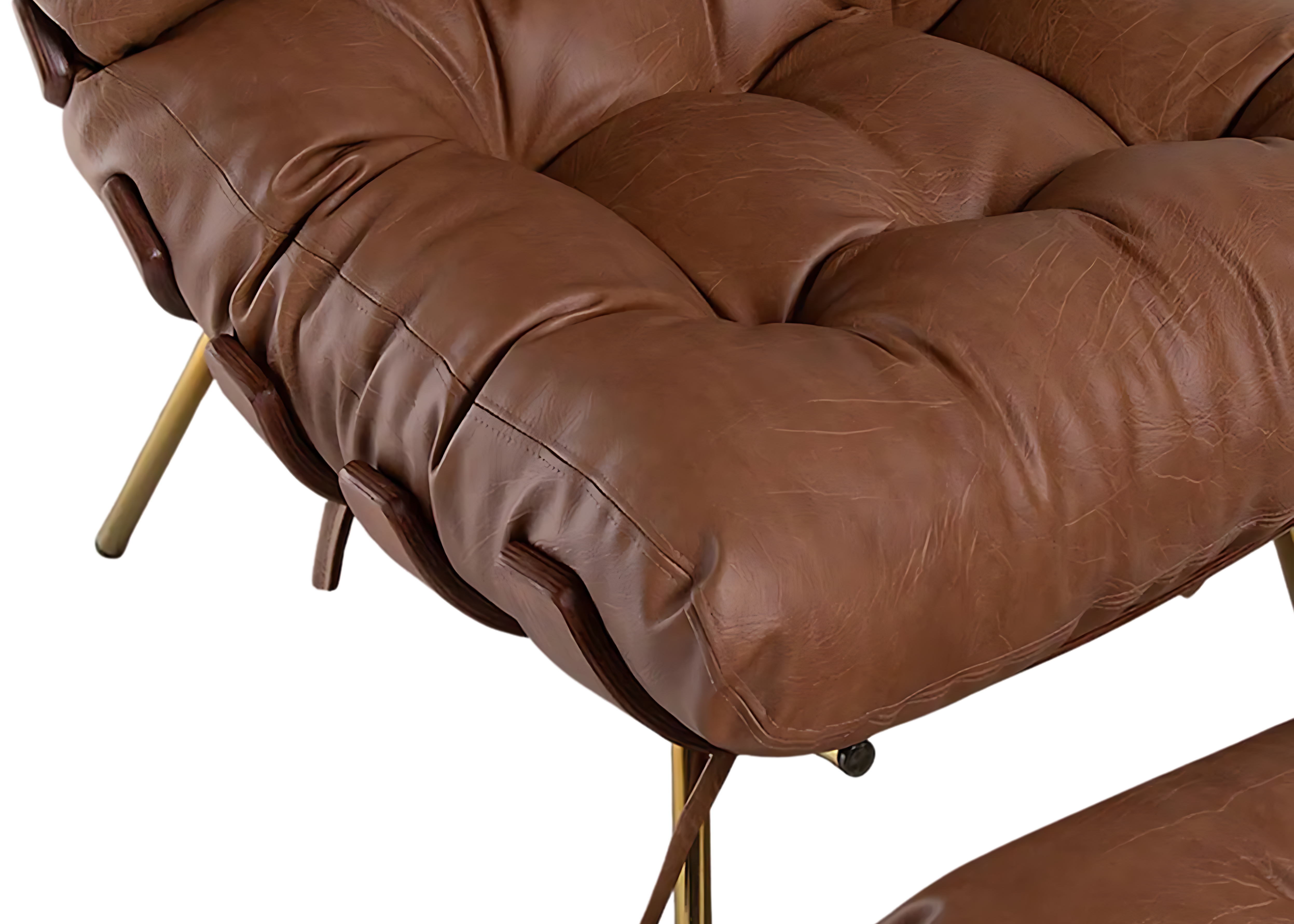 Detalhe do estofado da Poltrona Costela com Puff destacando o acabamento acolchoado e o conforto da peça.
