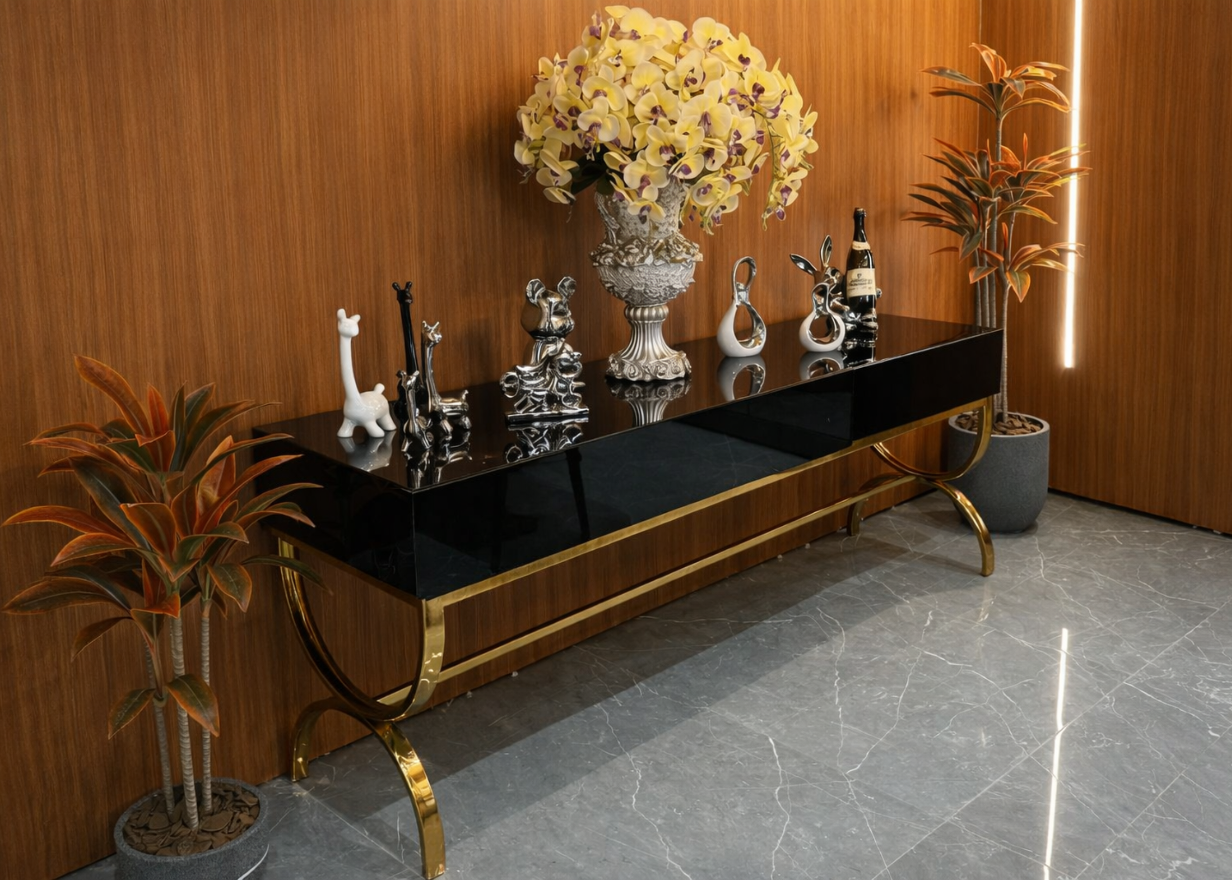 Aparador dourado luxuoso em inox gold, com tampo em vidro preto e design sofisticado, ideal para salas de estar, halls e ambientes elegantes.