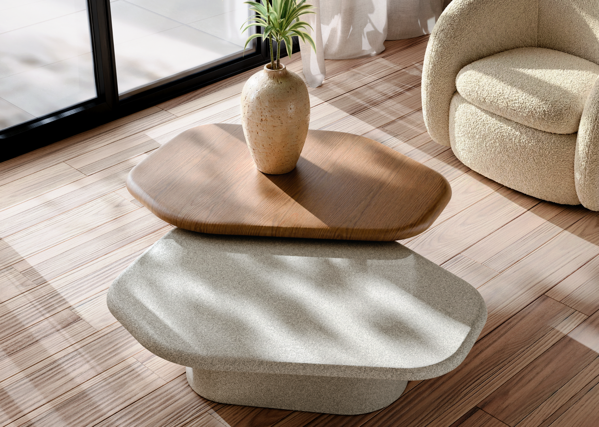Mesa de Centro Cora com tampo arredondado e base robusta em lâmina de madeira, destacando o design contemporâneo do móvel