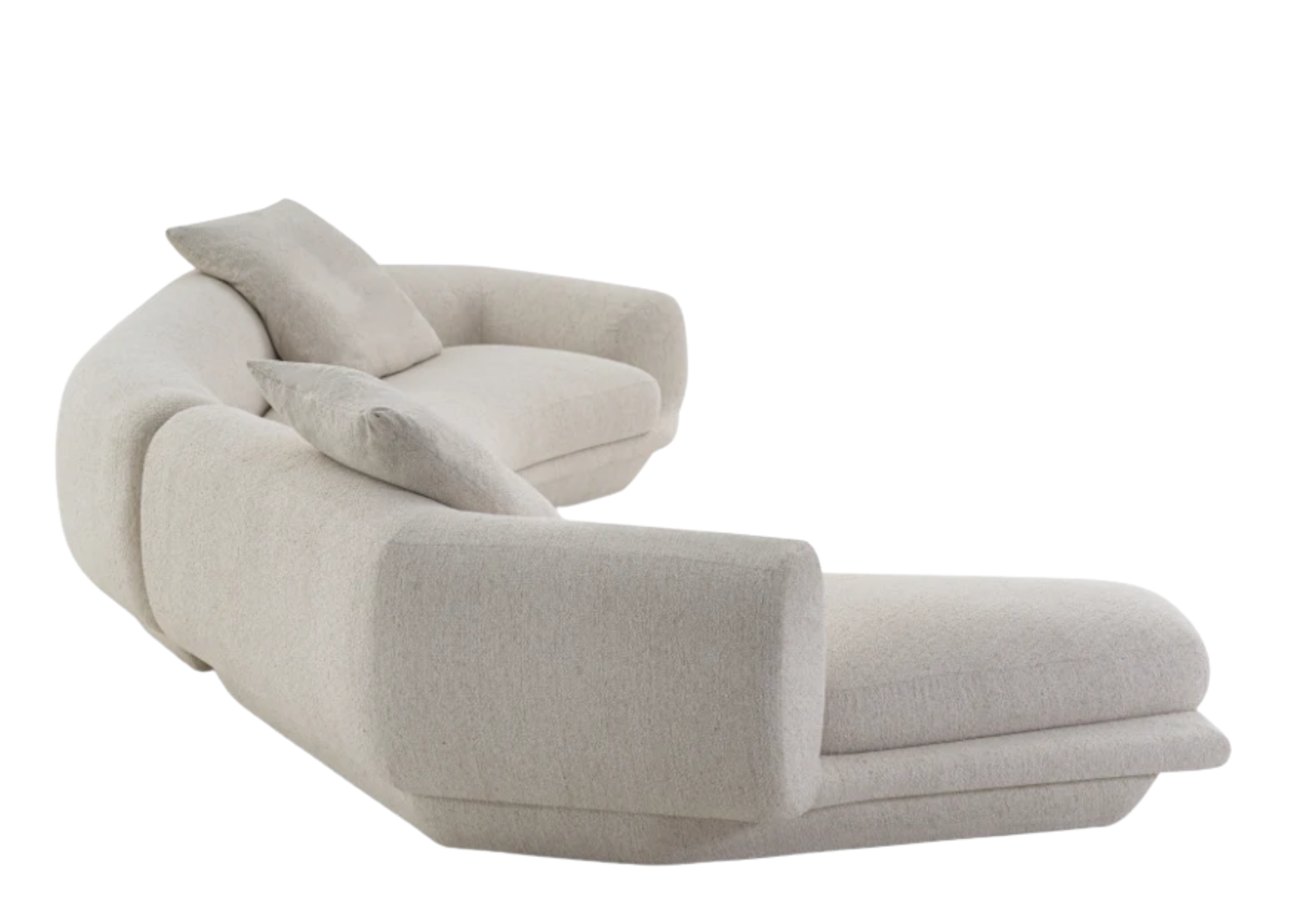 Sofá Átria em vista lateral com almofadas decorativas, apresentando design elegante e sofisticado, ideal para compor ambientes modernos e acolhedores.