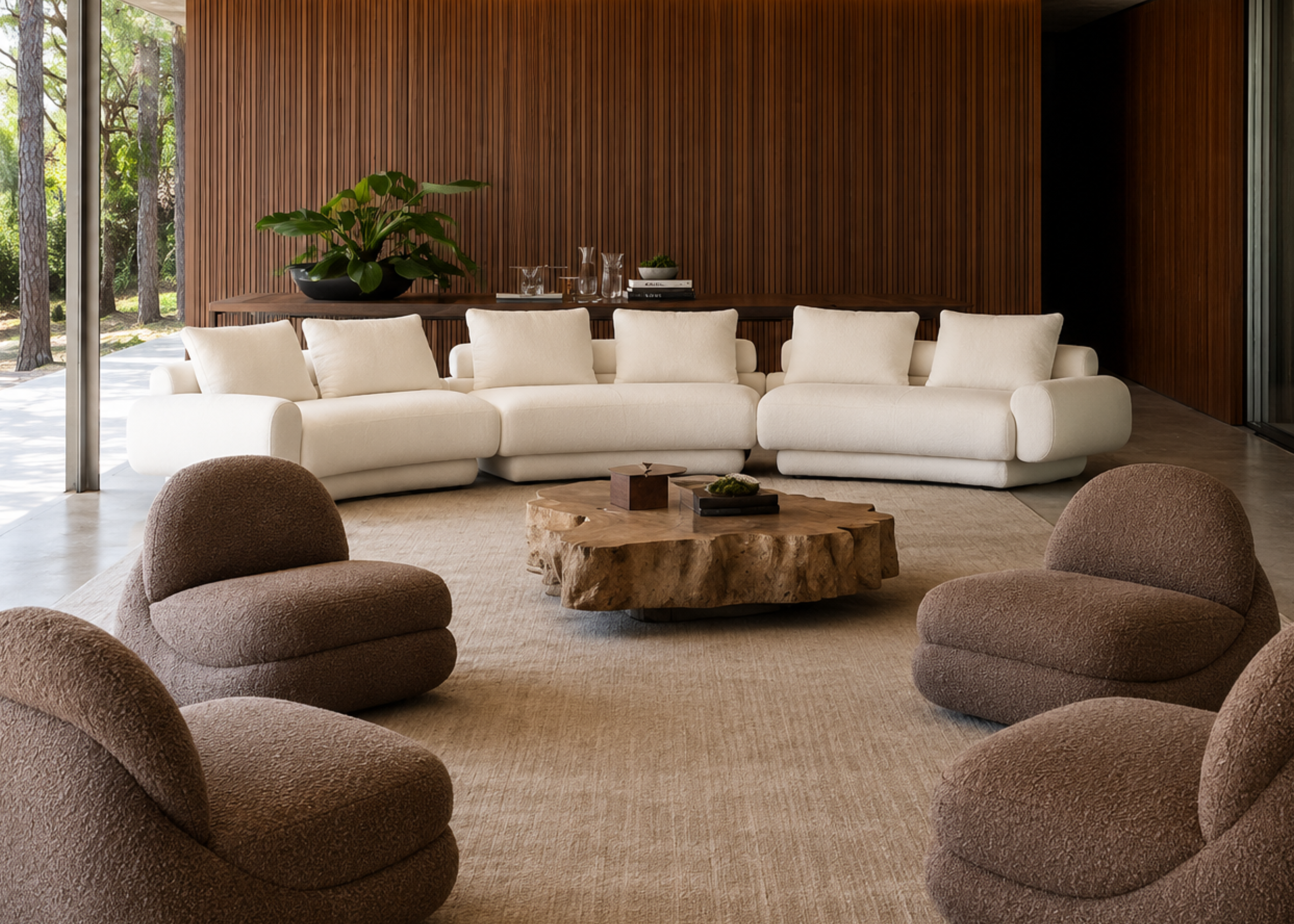 Sofá Curvo Cylos com design moderno e sofisticado, proporcionando conforto para momentos de descanso em ambientes elegantes e acolhedores.