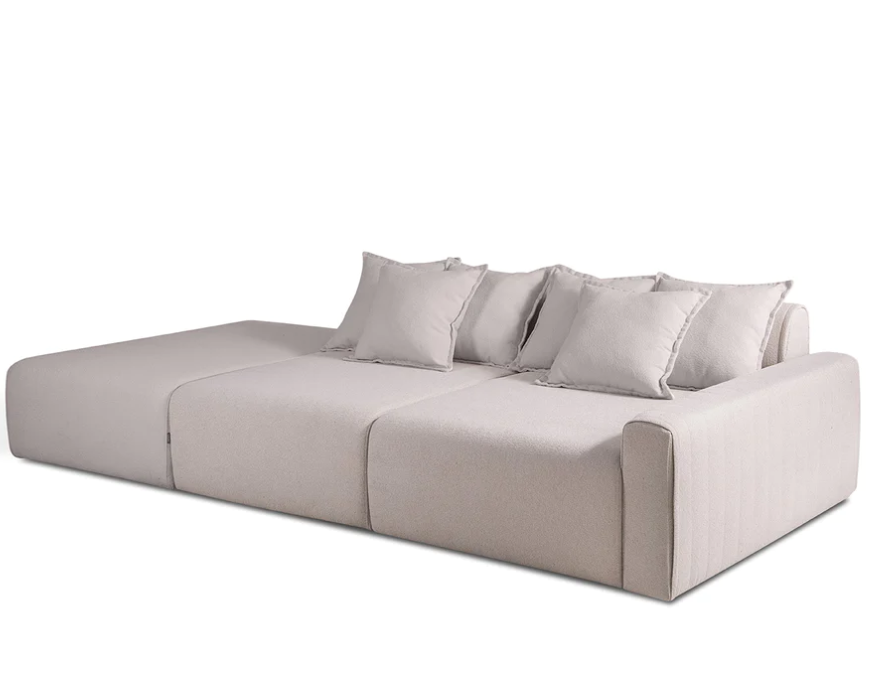 Sofá Ilha Malta com puff lateral, encosto deslizante manual e almofadas soltas. Sofá moderno e confortável para ambientes integrados.