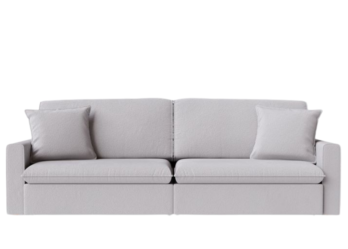 Sofá Lumier com almofadas decorativas, apresentando design elegante e sofisticado, ideal para compor ambientes modernos, acolhedores e refinados.